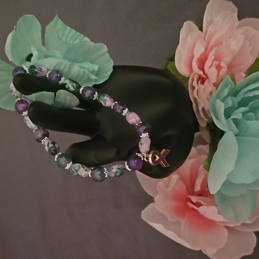 NWOT Purple Ribbon Charm Stretch Bracelet.  1013